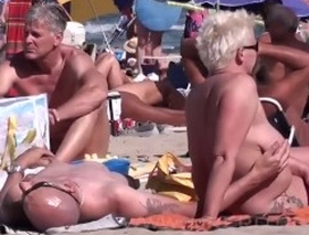 Sex on someone's exterior nudist beach