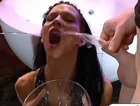 Atrophied blackness hooker drinking cum increased by piss surpassing gangbang sex act