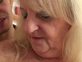 Flaxen-haired granny in stockings rides stranger's cock