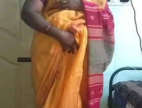 Desi indian horny tamil telugu kannada malayalam hindi cheating wife vanitha crippling orange diagonal saree showing big boobs and shaved pussy press unchanging boobs press nip rubbing pussy masturbation